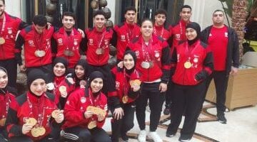 102 ميدالية متنوعة بعثة رفع الأثقال تصل القاهرة بعد السيطرة