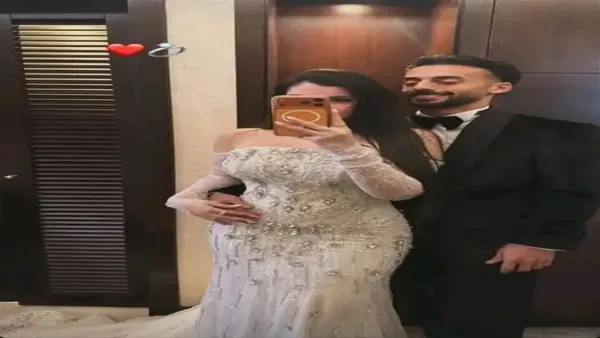 إطلالة أحمد عبد القادر وزوجته في زفافهما بتصميم إسلام سعد تكشف تفاصيل تحضيرات العرس