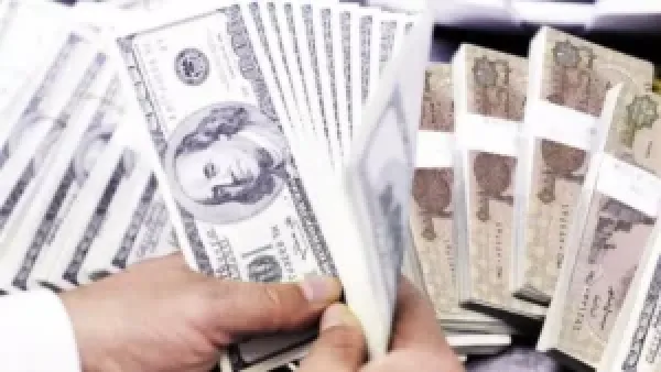 شبكة تجارة العملات السرية في الجيزة تُضبط بمبالغ مالية كبيرة تؤثر على السوق المحلية